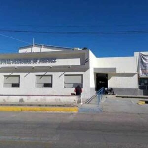 Prensado entre una retroexcavadora y un tráiler